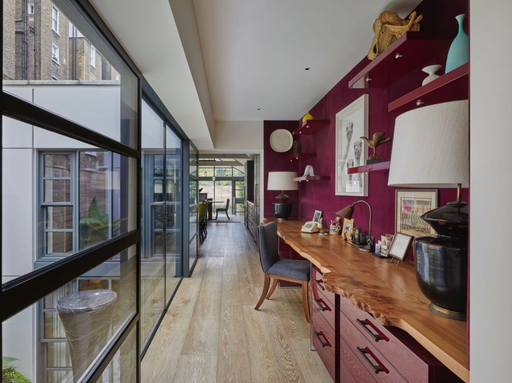 Study with live edge desk, crittall doors and windows and velvet walls
