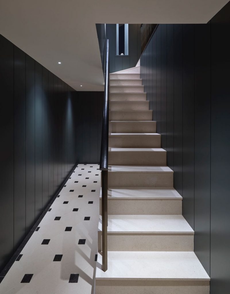 limestone staircase bronze spindles and leather handrail by Bill Amberg