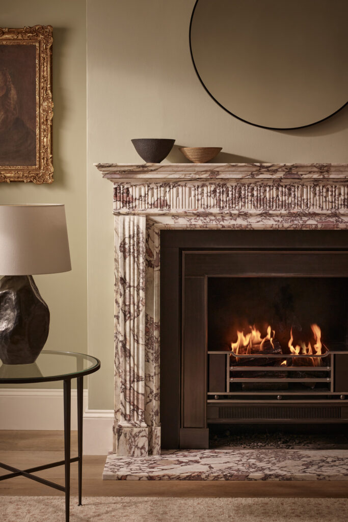 The Higham Chimneypiece pictured in Breche Violette marble
