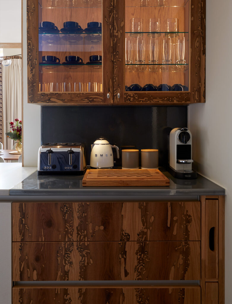 chalet kitchen briccola timber breakfast bar with integrated tray and flush drawers