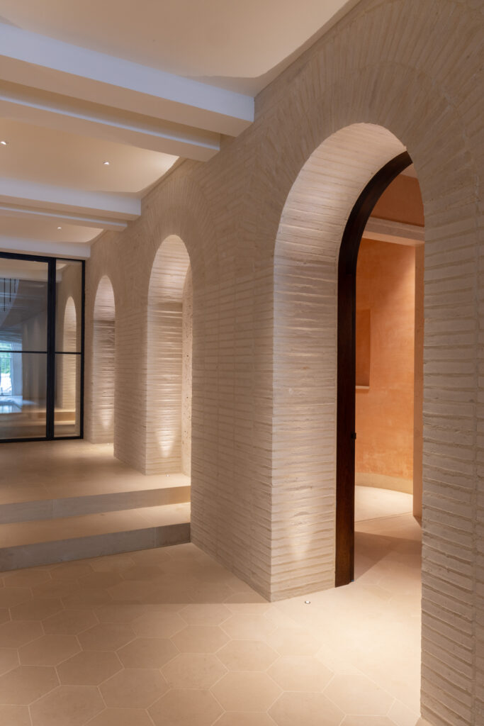 indoor swimming pool complex with lighting by Sally Storey